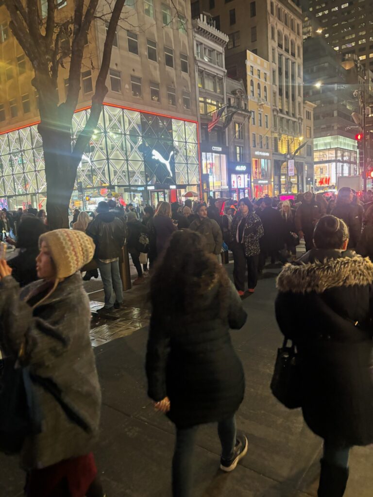 Paul Arata Rockefeller Center in NYC at Christmas around the Christmas Tree